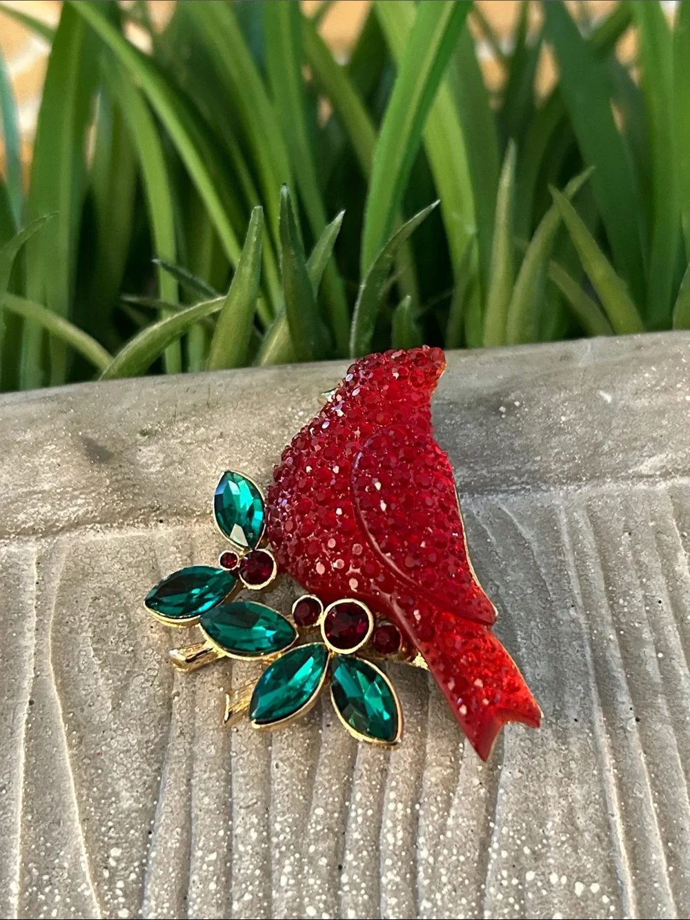 Red Cardinal Crystal Brooch with Emerald Green leaf Accents in goldtone branch